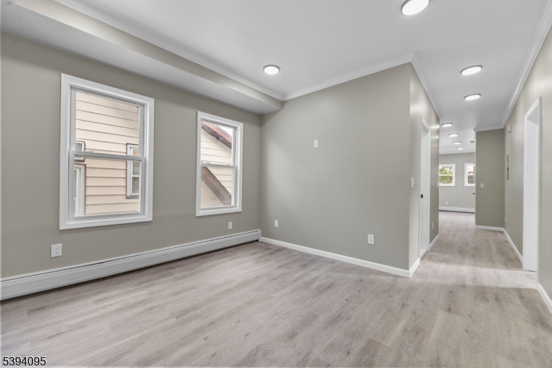 1033 East 23rd Street, Unit 2 Paterson, NJ 07513 - Photo 12 of 21 a view of livingroom with window