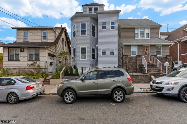 a car parked in front of a house