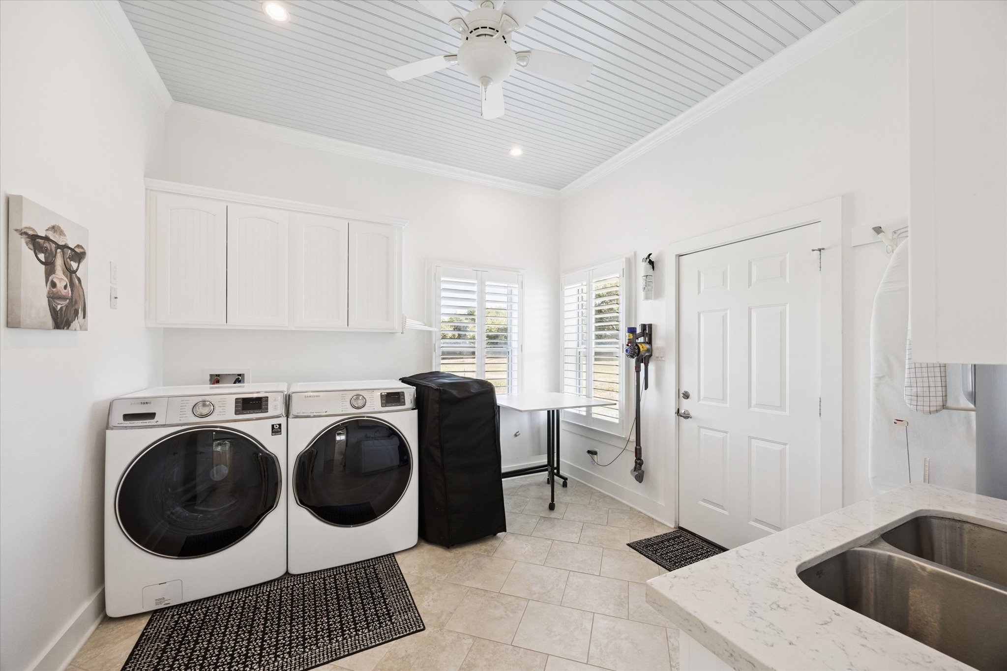 5100 Jaeger Road Burton, TX 77835 - Photo 22 of 34 Laundry area featuring cabinet space, crown molding, washer and clothes dryer, a ceiling fan, and recessed lighting