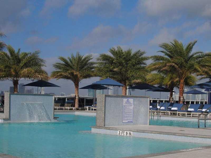 400 Alton Road, Unit 1011 Miami Beach, FL 33139 - Photo 13 of 13 a front view of a house with garden