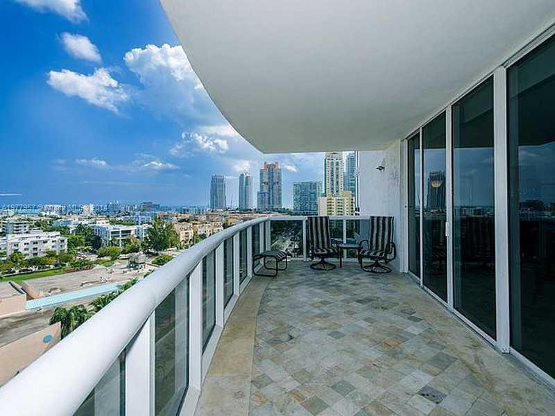 400 Alton Road, Unit 1011 Miami Beach, FL 33139 - Photo 2 of 13 a view of a porch with wooden floor and seating space