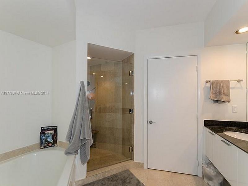 400 Alton Road, Unit 1011 Miami Beach, FL 33139 - Photo 9 of 13 a bathroom with a shower