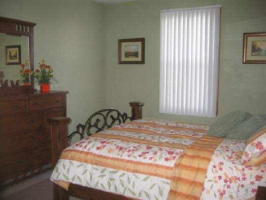 10135 Monarch Road Roscoe, IL 61073 - Photo 3 of 9 a bedroom with a bed and a window