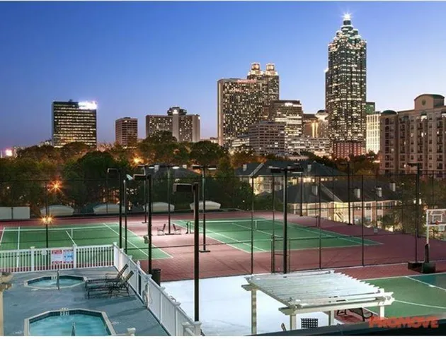 a view of a city with tall buildings