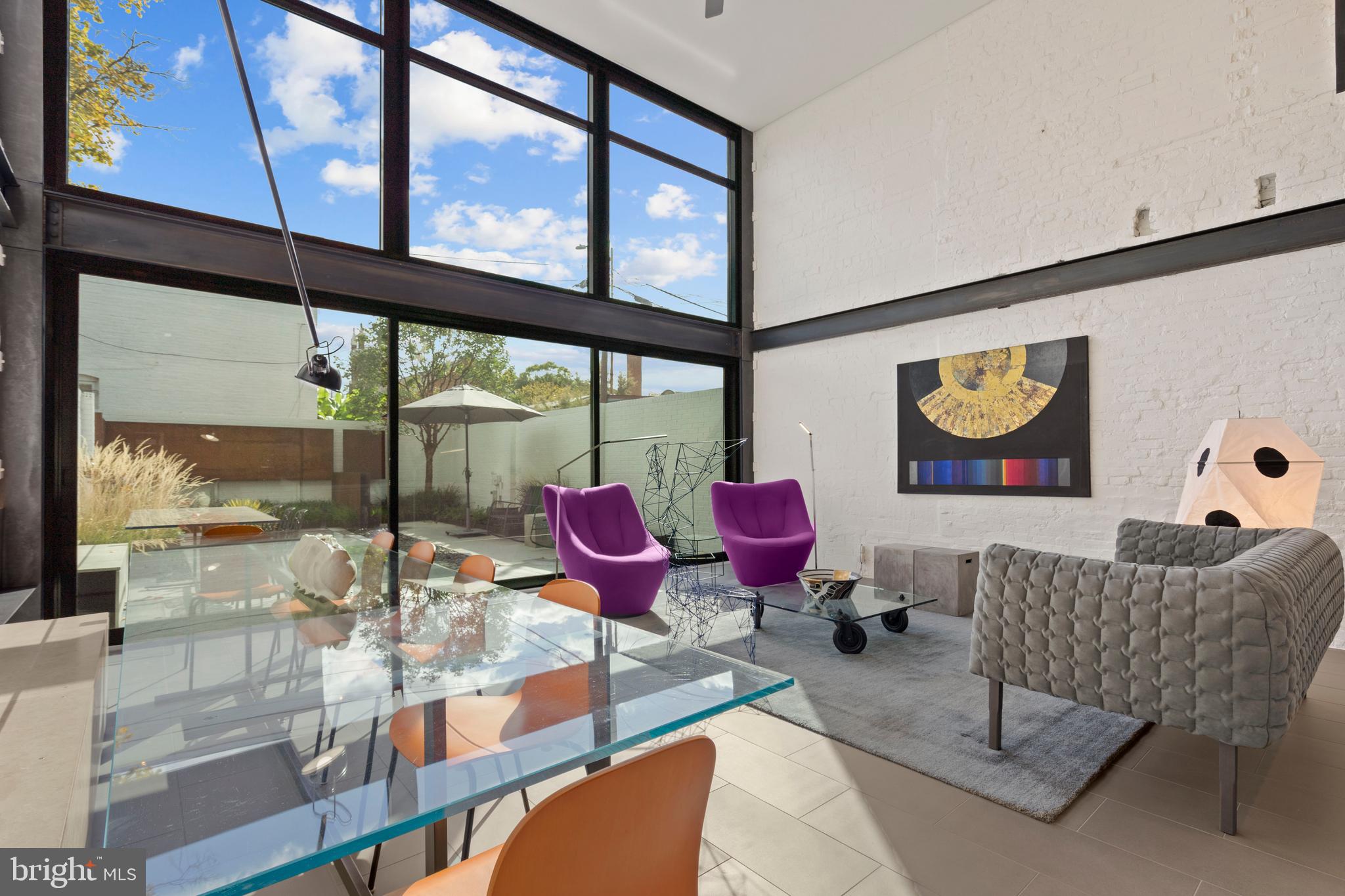 633 E Street Southeast Washington, DC 20003 - Photo 13 of 52 a very nice looking living room with furniture and floor to ceiling window