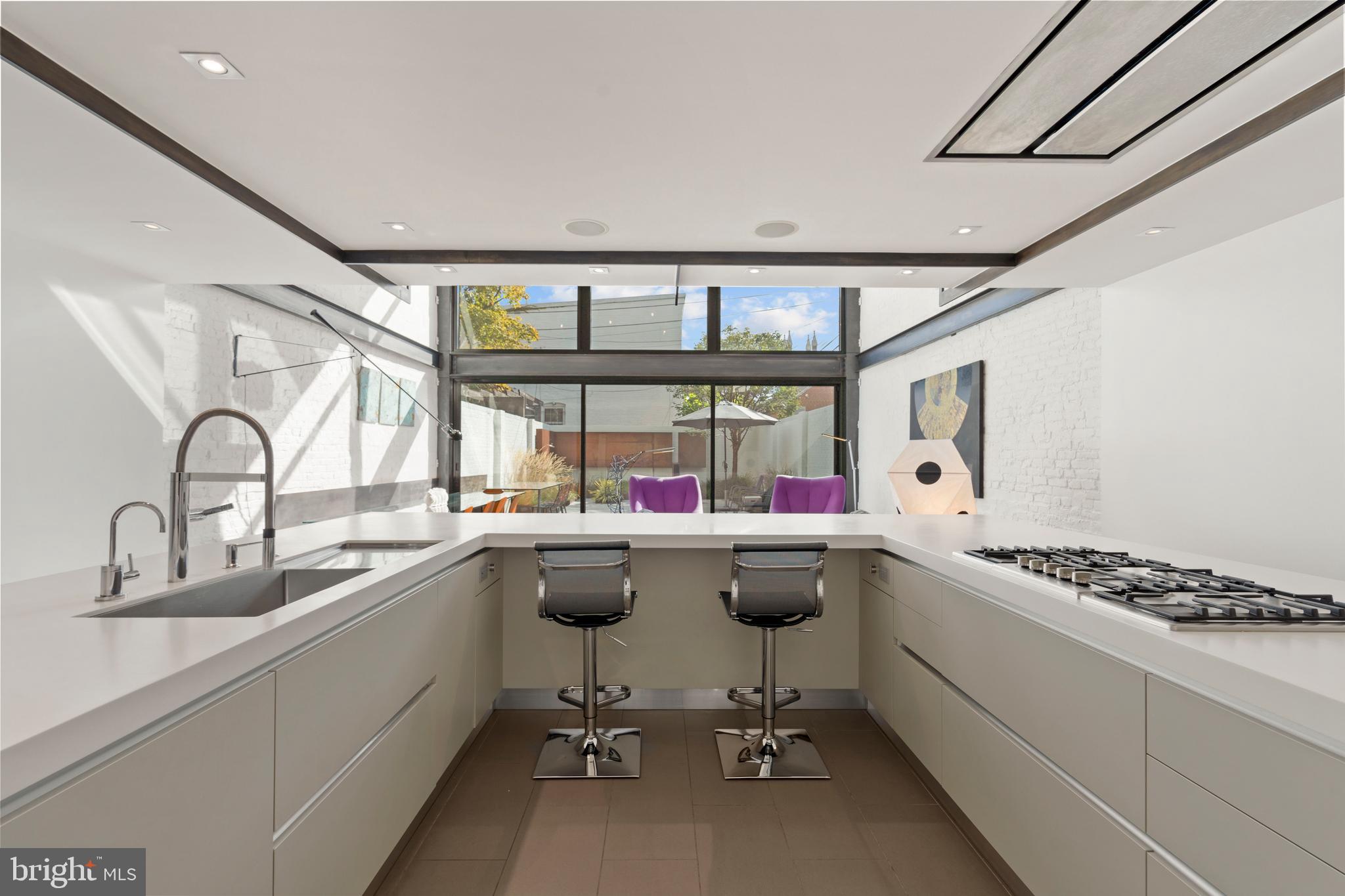 633 E Street Southeast Washington, DC 20003 - Photo 14 of 52 a kitchen with a sink and appliances