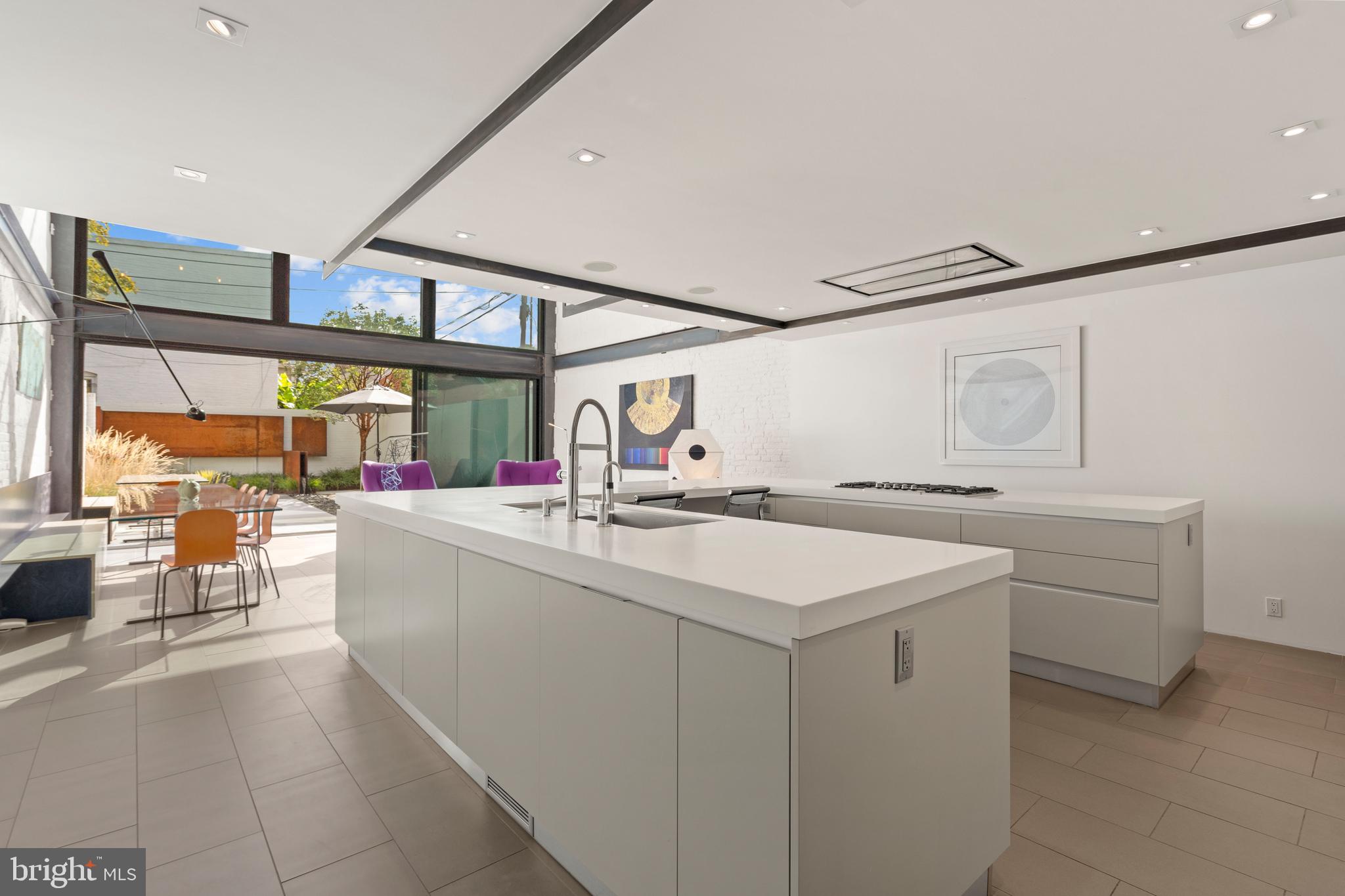 633 E Street Southeast Washington, DC 20003 - Photo 15 of 52 a kitchen with sink cabinets and living room