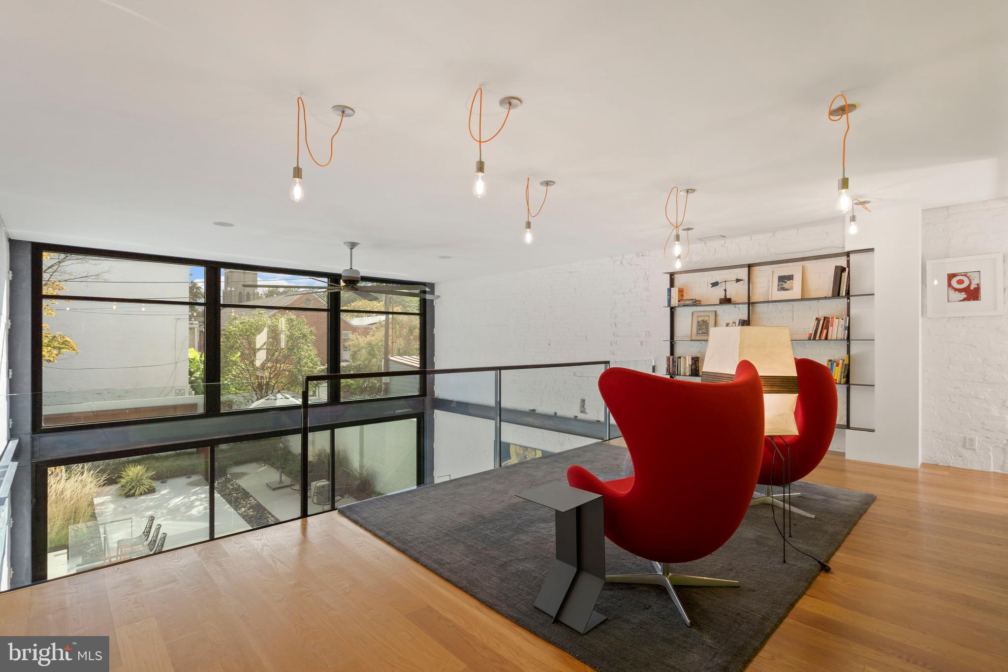 633 E Street Southeast Washington, DC 20003 - Photo 20 of 52 a living room with furniture and a window