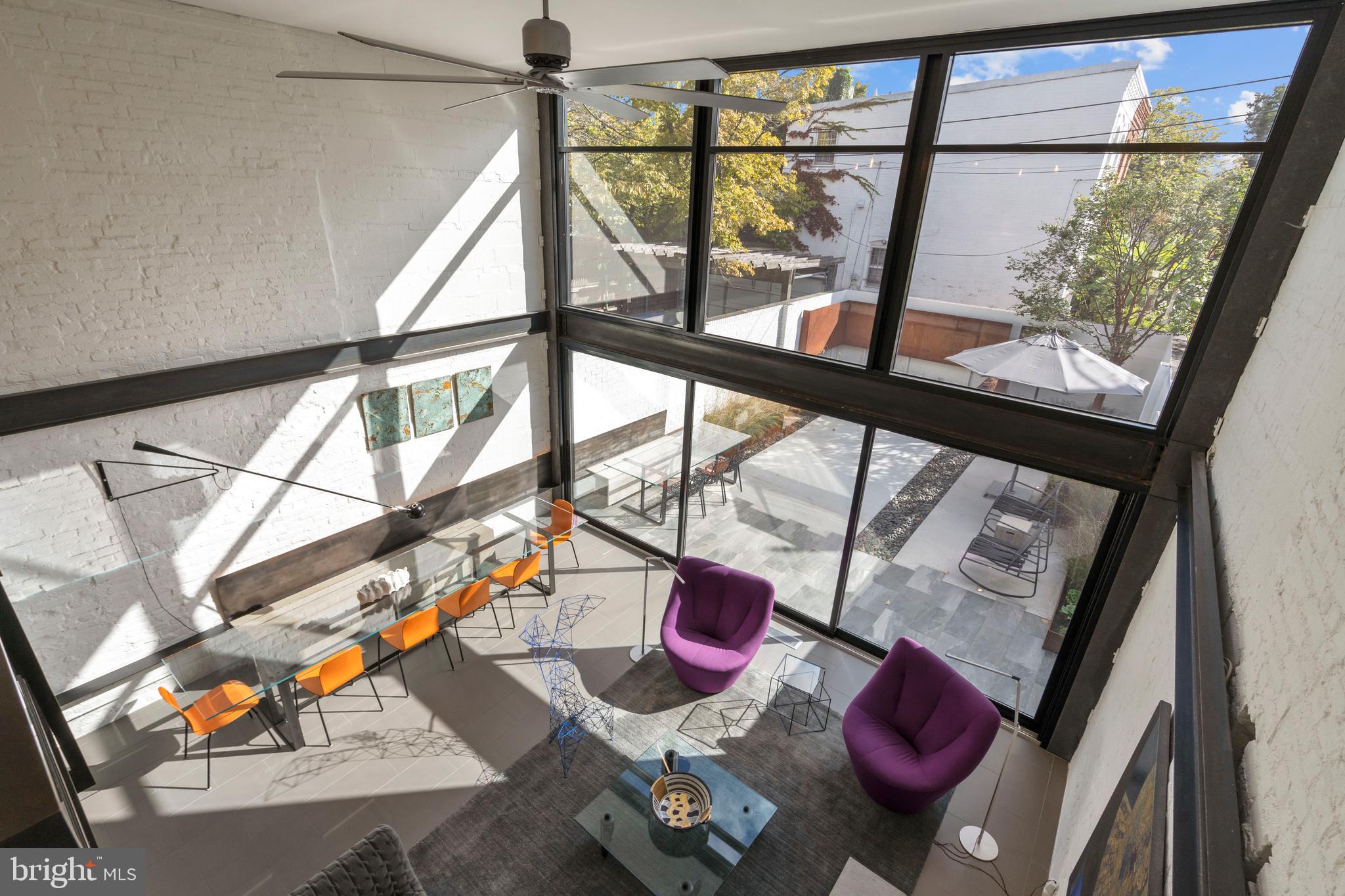 633 E Street Southeast Washington, DC 20003 - Photo 22 of 52 a living room filled with furniture and next to a window
