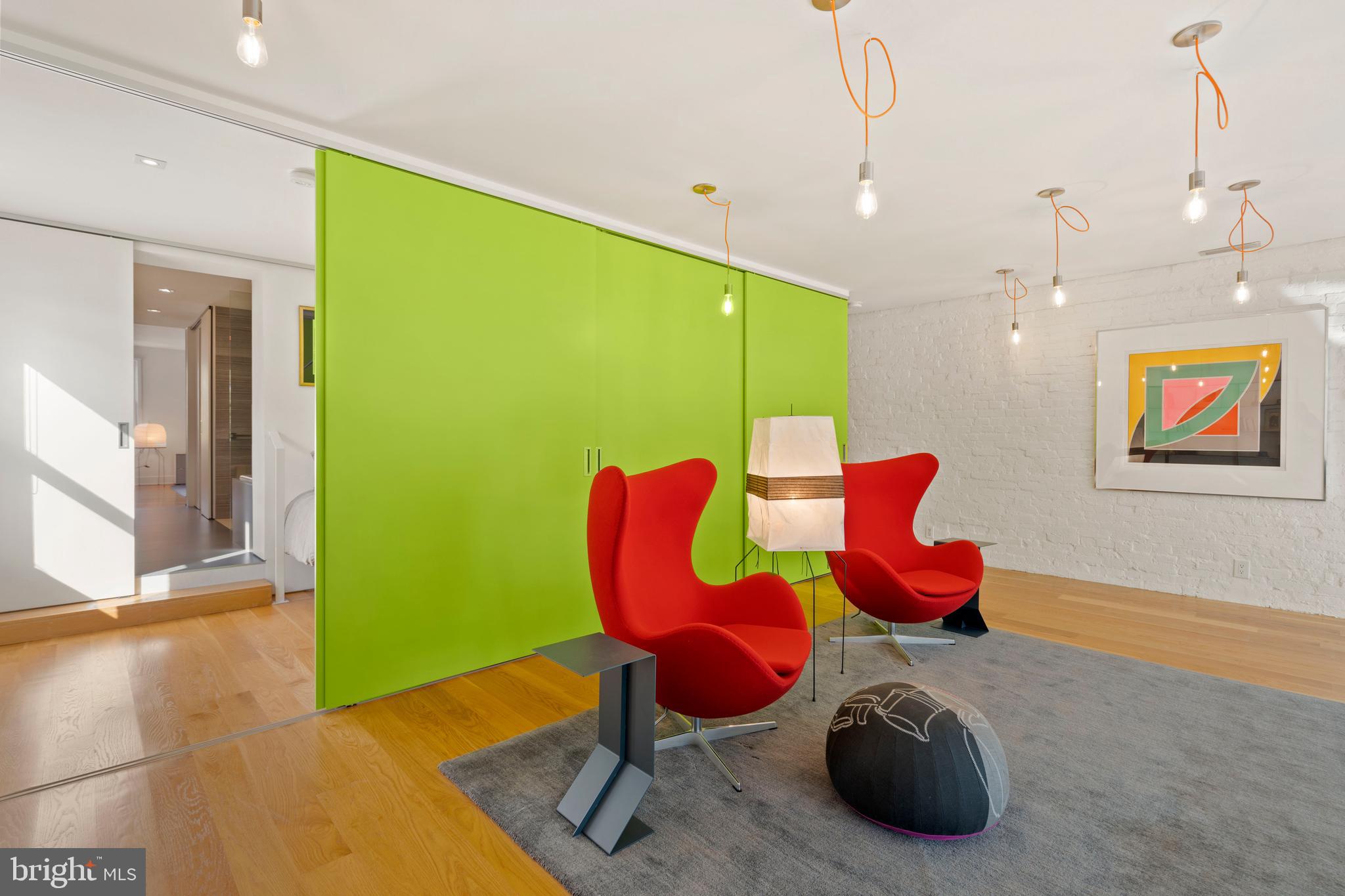 633 E Street Southeast Washington, DC 20003 - Photo 24 of 52 a room with furniture and wooden floor