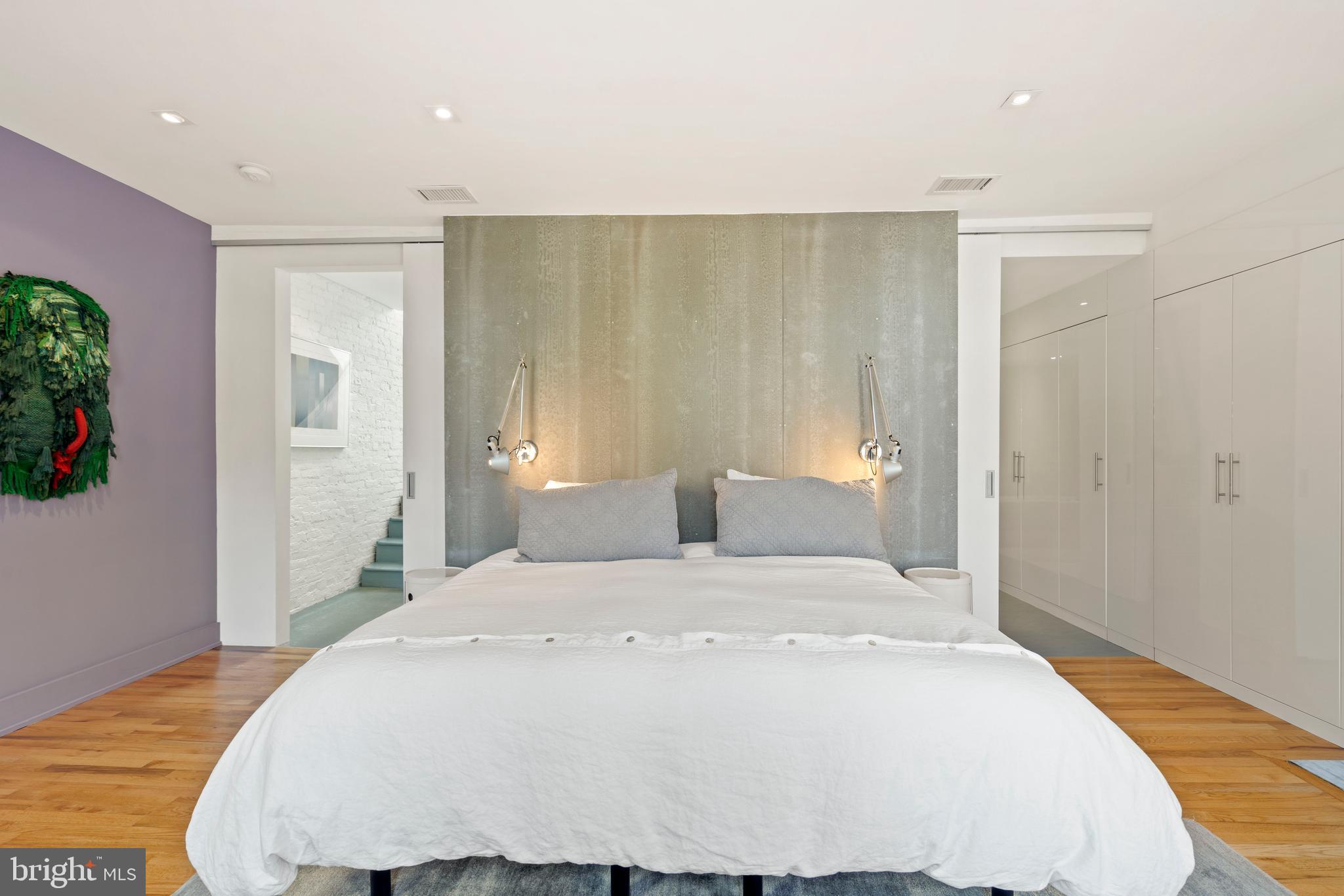 633 E Street Southeast Washington, DC 20003 - Photo 25 of 52 a large white bed in a white room