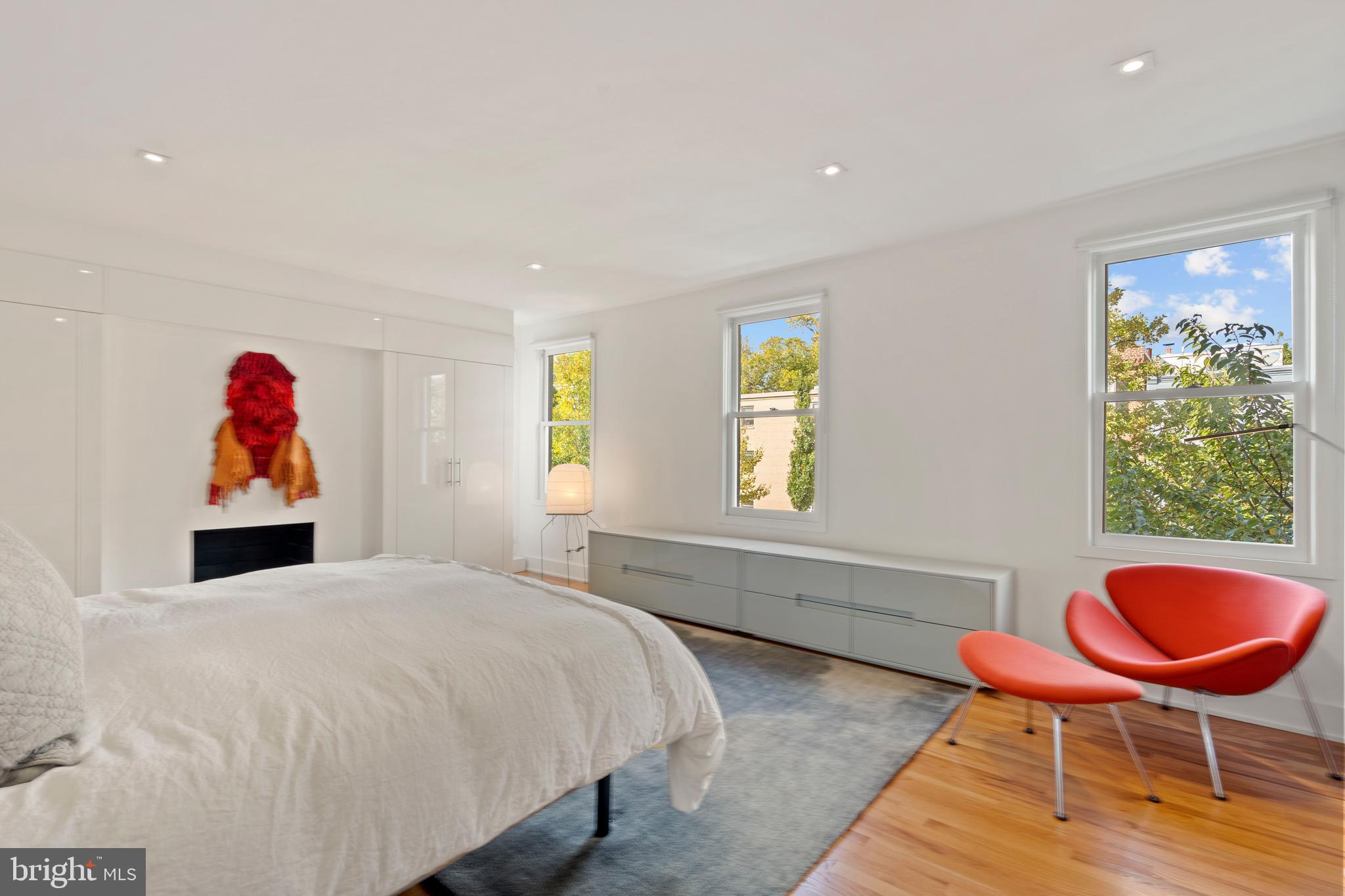 633 E Street Southeast Washington, DC 20003 - Photo 26 of 52 a bed room with a bed and a chair