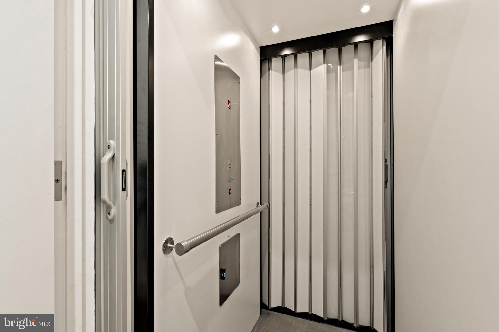 633 E Street Southeast Washington, DC 20003 - Photo 33 of 52 a view of a hallway with wooden floor and entryway