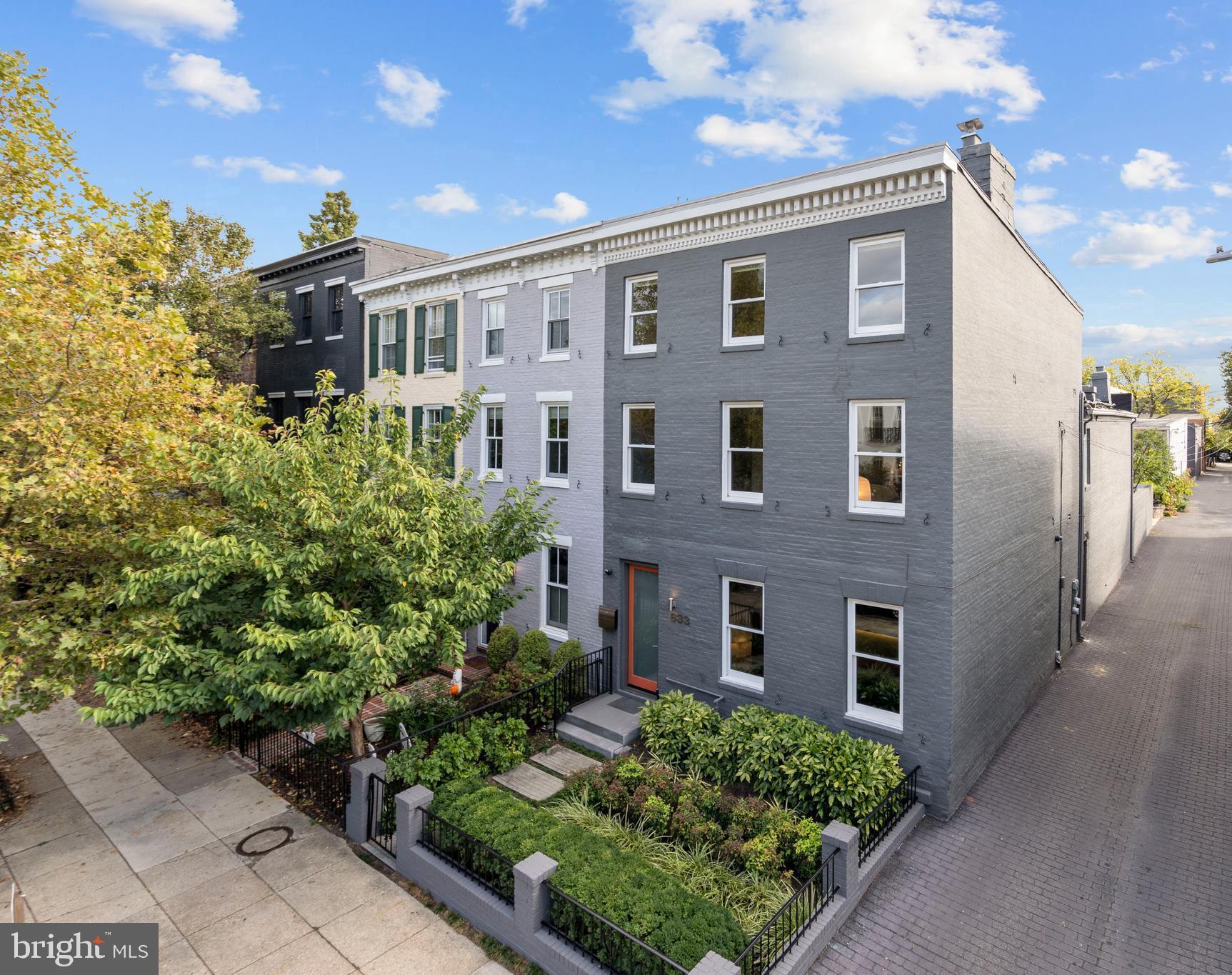 633 E Street Southeast Washington, DC 20003 - Photo 47 of 52 a front view of a house with a yard