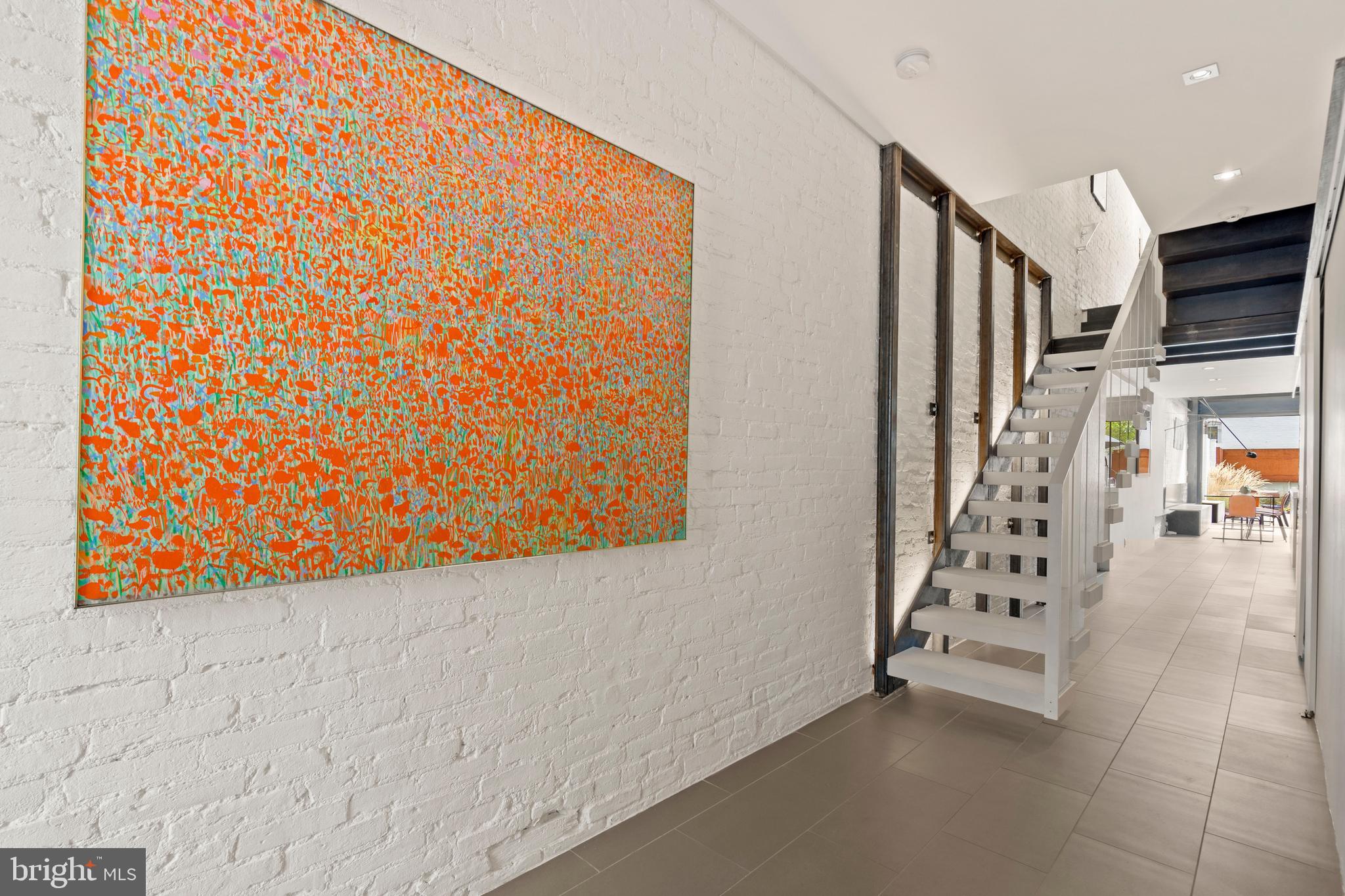 633 E Street Southeast Washington, DC 20003 - Photo 8 of 52 a view of an empty room with stairs
