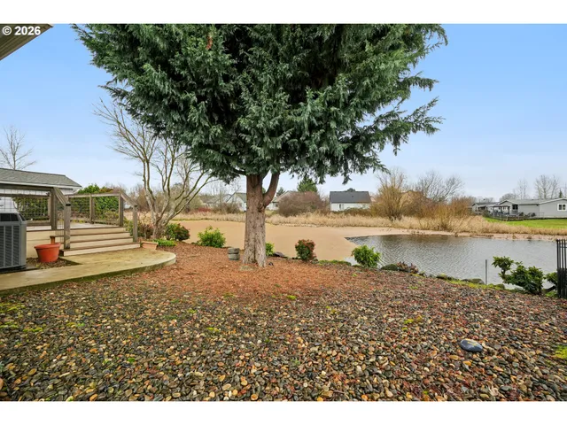 a view of wooden floor with a lake view