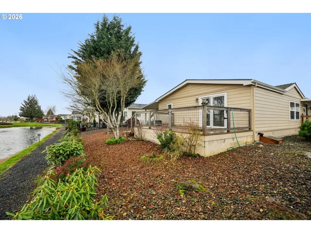 a view of a lake with a big yard