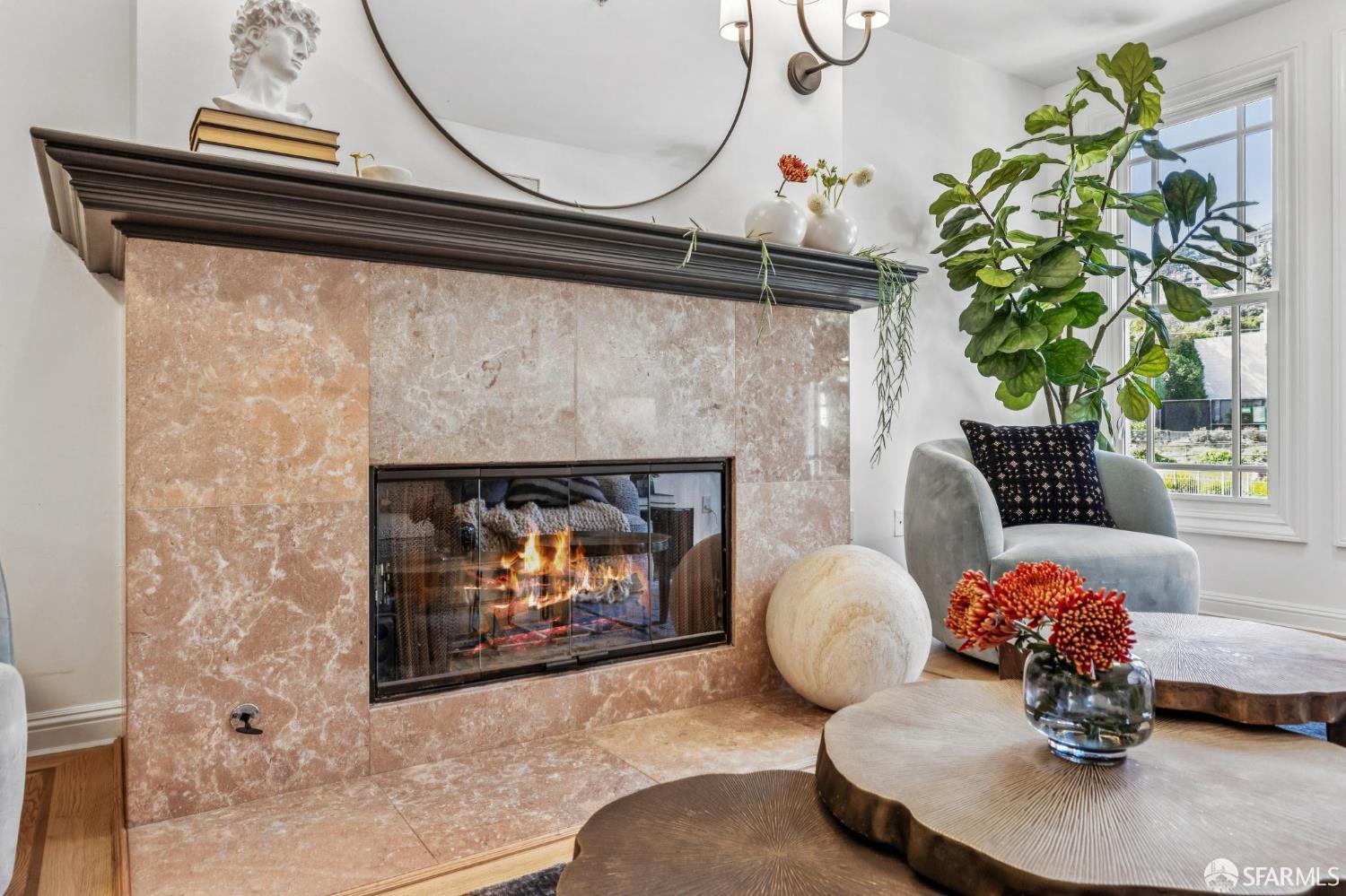 729 Douglass Street, Unit A San Francisco, CA 94114 - Photo 14 of 56 a living room with furniture and a fireplace