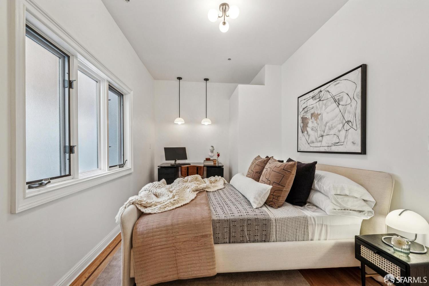 729 Douglass Street, Unit A San Francisco, CA 94114 - Photo 37 of 56 a bedroom with furniture and a window