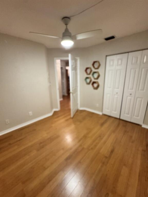 6864 Torch Key Street Lake Worth, FL 33467 - Photo 12 of 13 wooden floor in an empty room