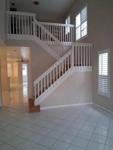 a view of hallway with cabinet and cabinet