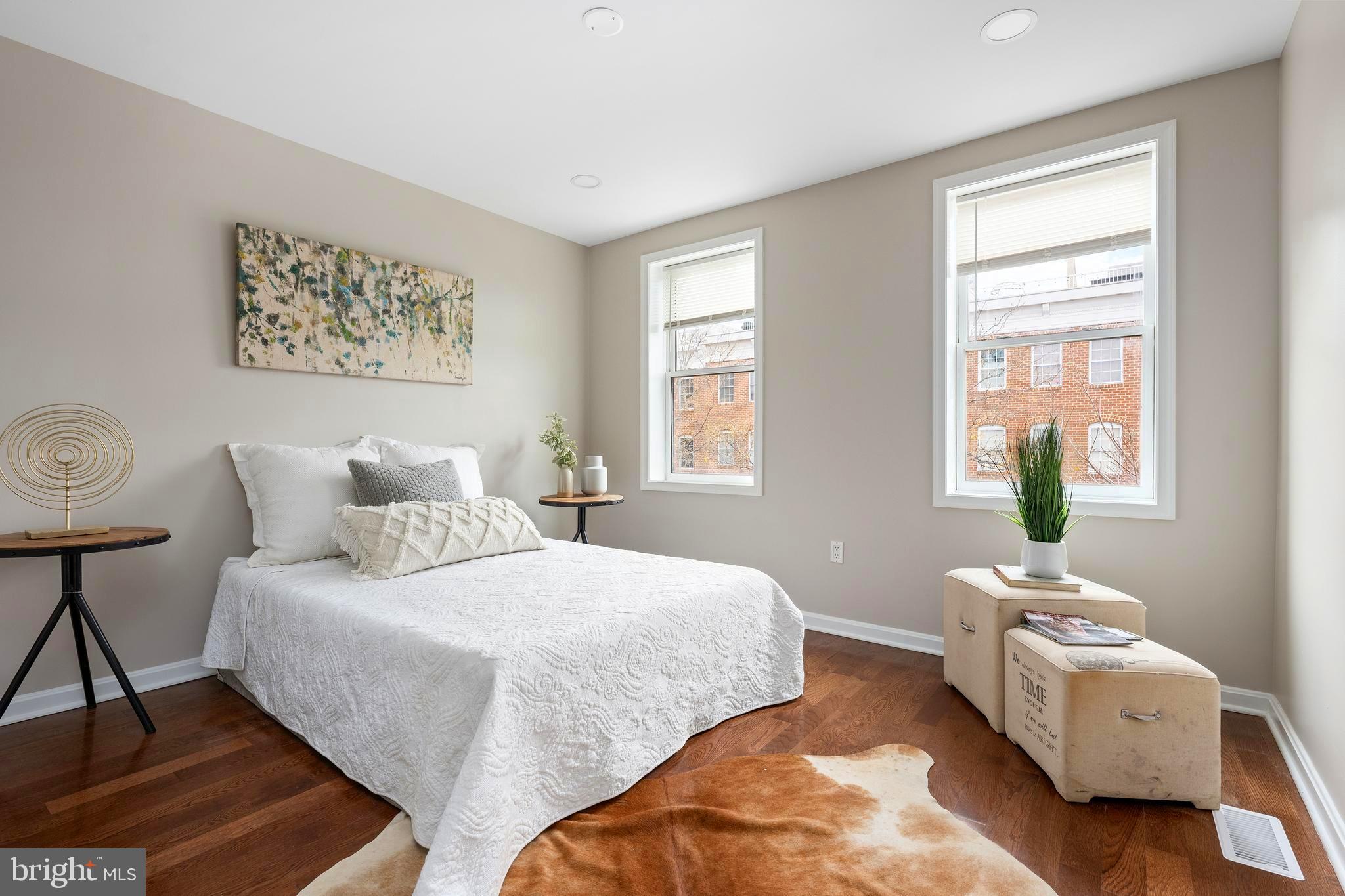 1358 Towson Street Baltimore, MD 21230 - Photo 18 of 51 a bedroom with two beds and a window