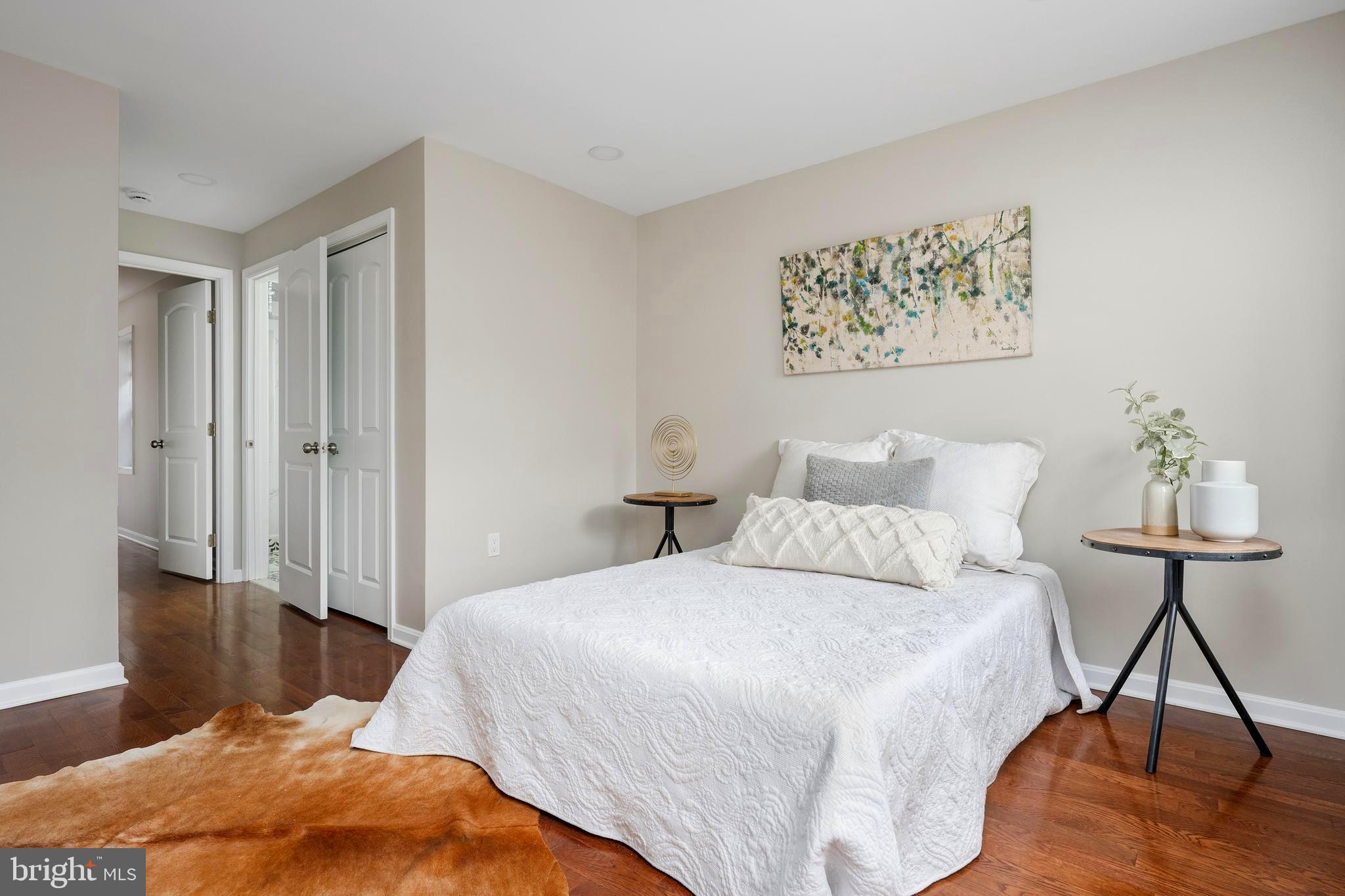 1358 Towson Street Baltimore, MD 21230 - Photo 19 of 51 a bedroom with a bed and a table in it