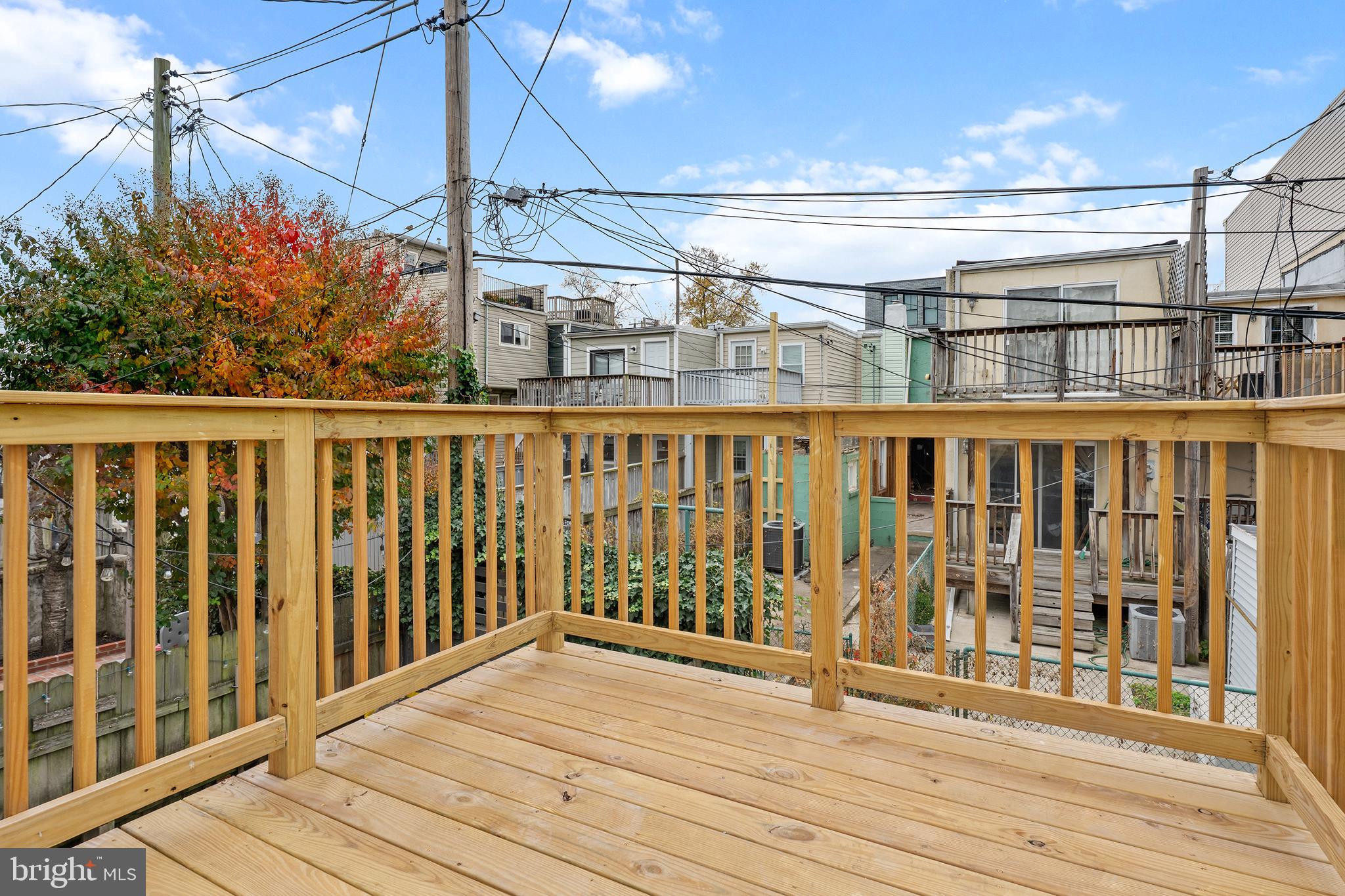 1358 Towson Street Baltimore, MD 21230 - Photo 47 of 51 a view of a balcony with wooden floor