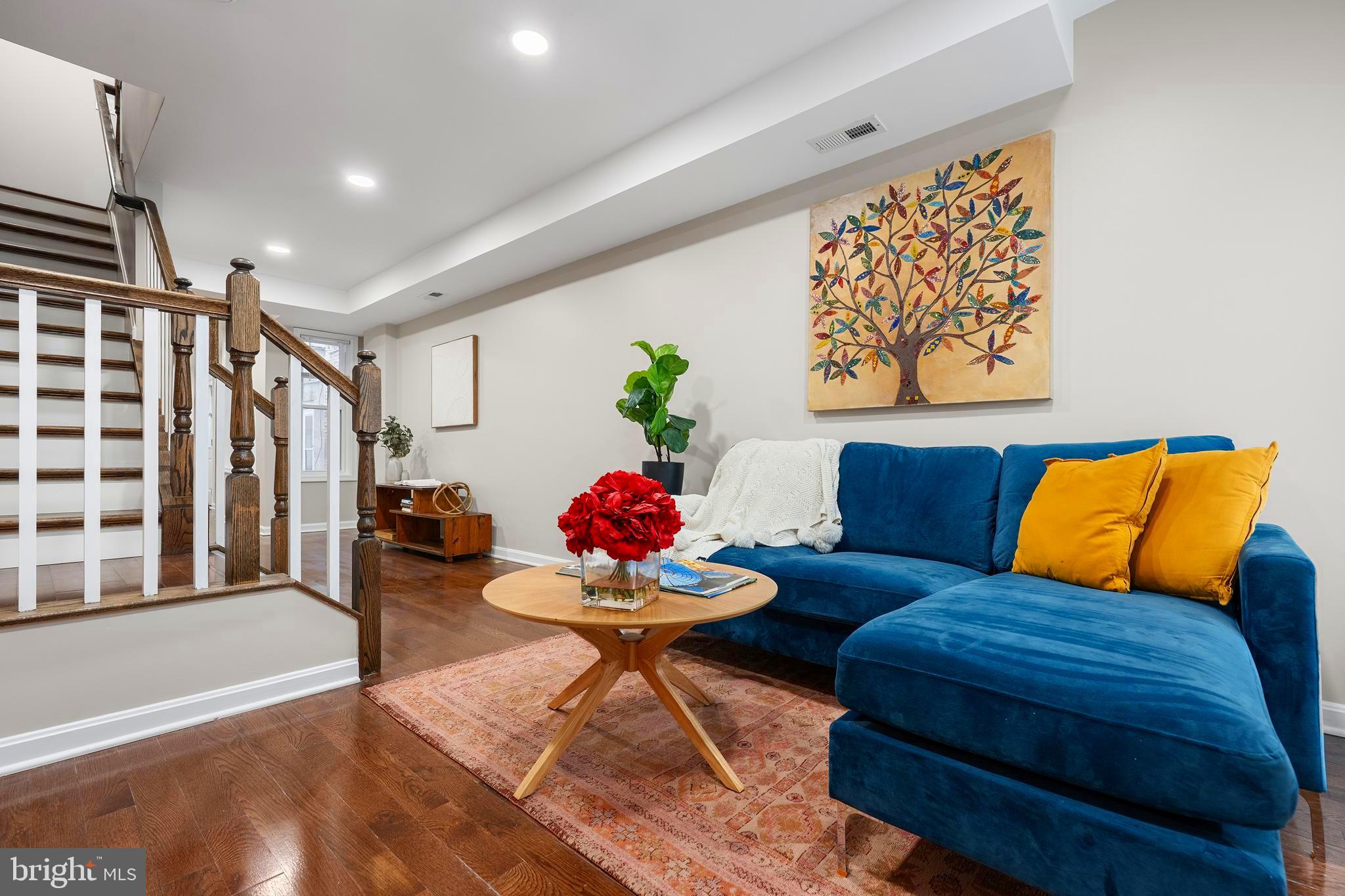1358 Towson Street Baltimore, MD 21230 - Photo 5 of 51 a living room with furniture and a couch