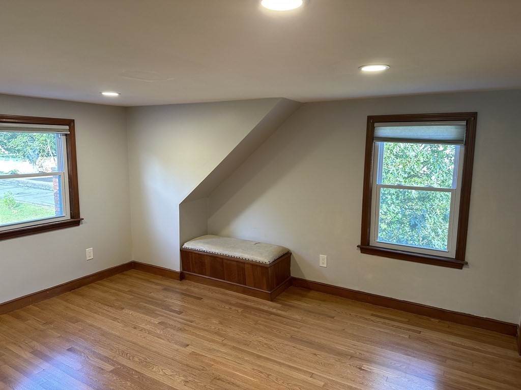 20 Eames Street North Reading, MA 01864 - Photo 13 of 13 a view of empty room with wooden floor and fan