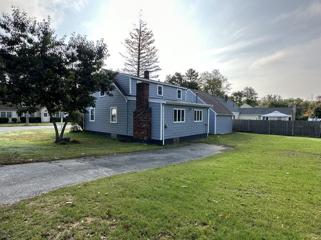 20 Eames Street North Reading, MA 01864 - Photo 2 of 13 a view of a house with a back yard