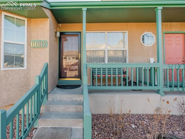 a view of a porch with a yard