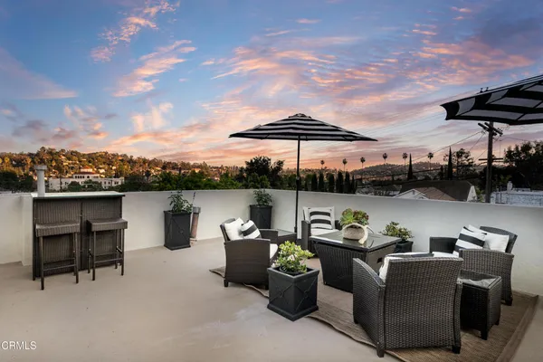 a view of a terrace with furniture