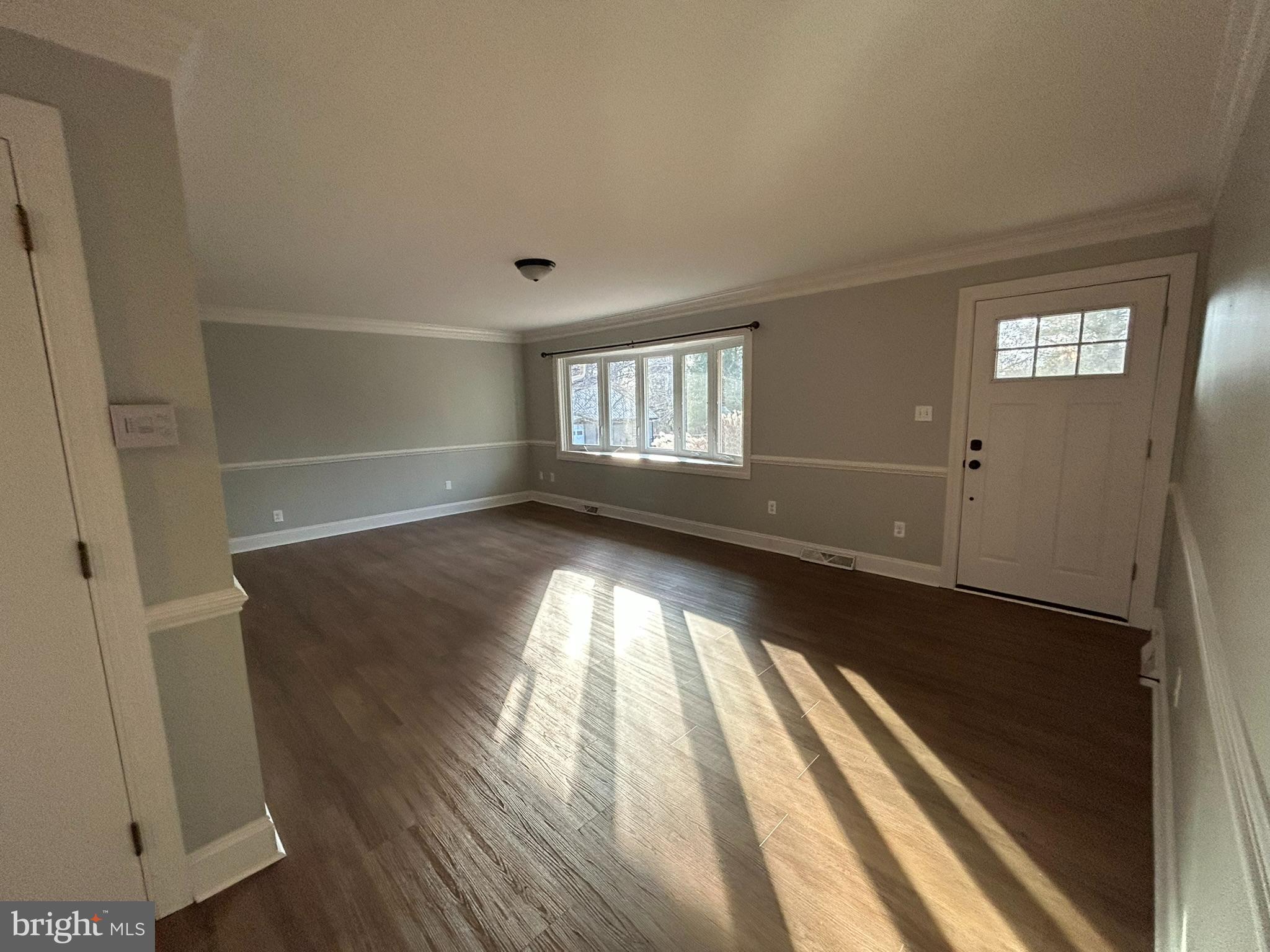 136 Cedar Knoll Road Coatesville, PA 19320 - Photo 11 of 28 wooden floor in an empty room with a window