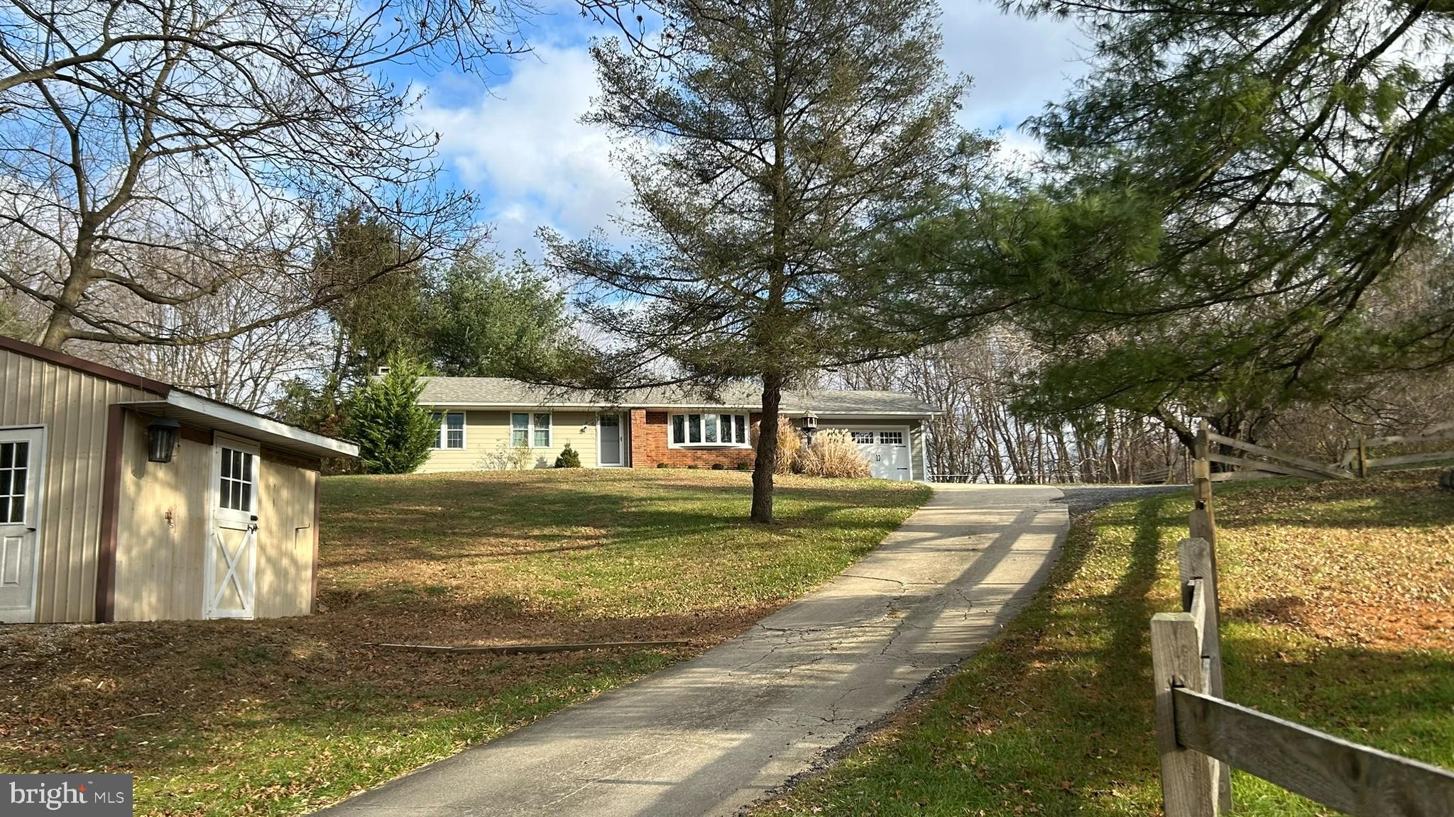 136 Cedar Knoll Road Coatesville, PA 19320 - Photo 2 of 28 a view of a house with a yard