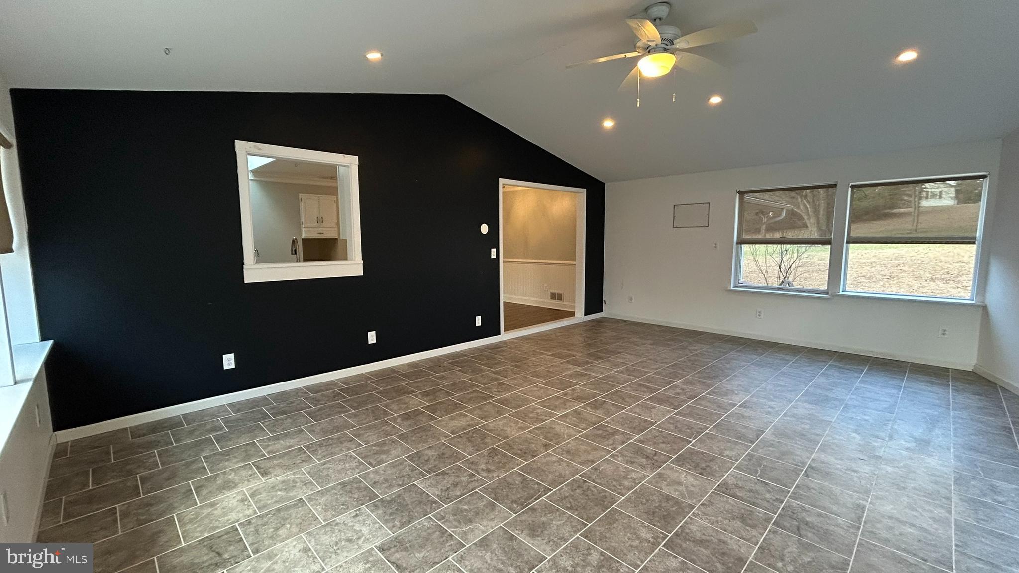 136 Cedar Knoll Road Coatesville, PA 19320 - Photo 9 of 28 a view of an empty room with a window