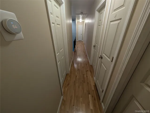 a view of a livingroom from a hallway