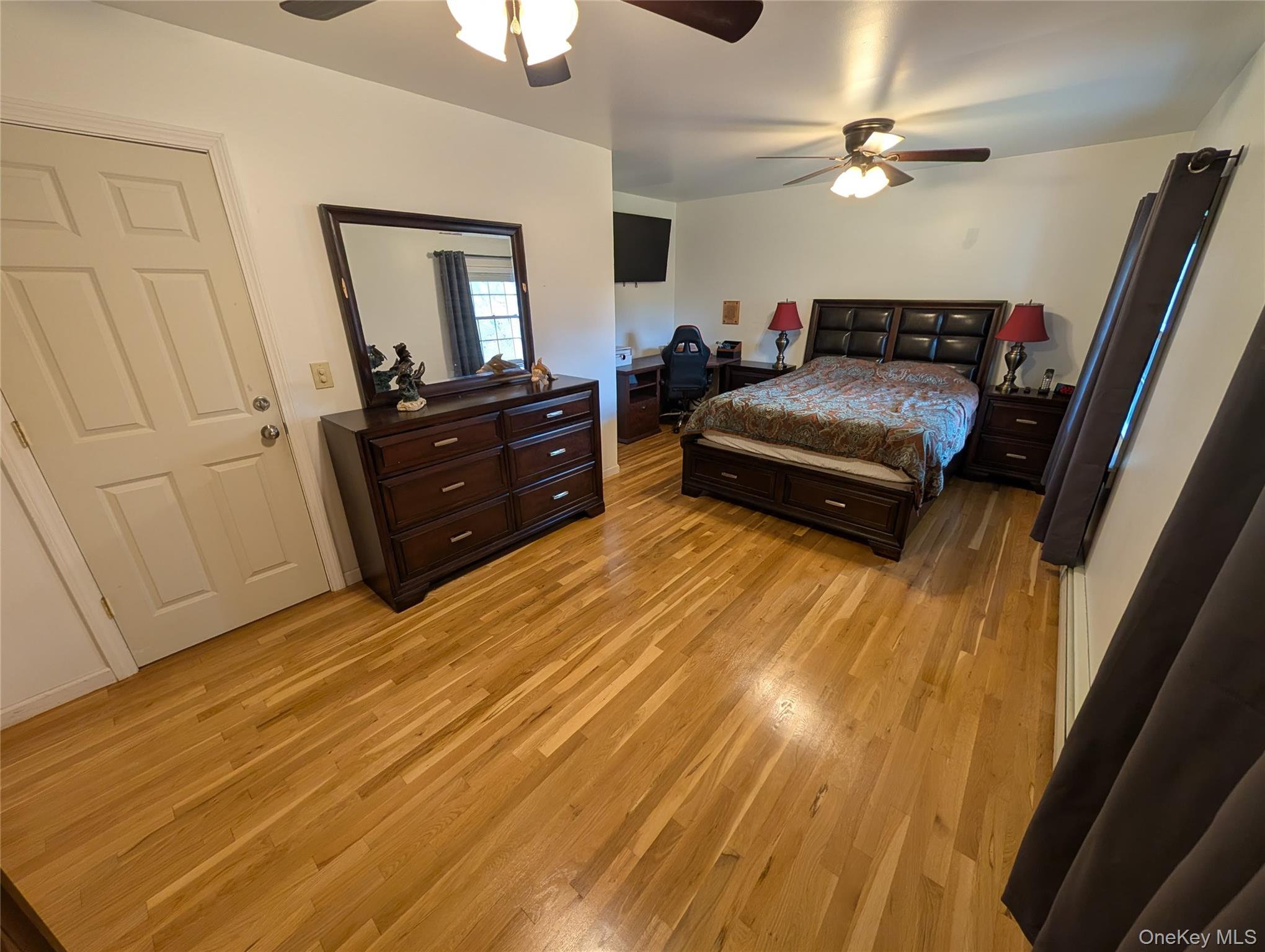 5 Equestrian Acres Lane Brewster, NY 10509 - Photo 23 of 50 a living room with furniture and a flat screen tv