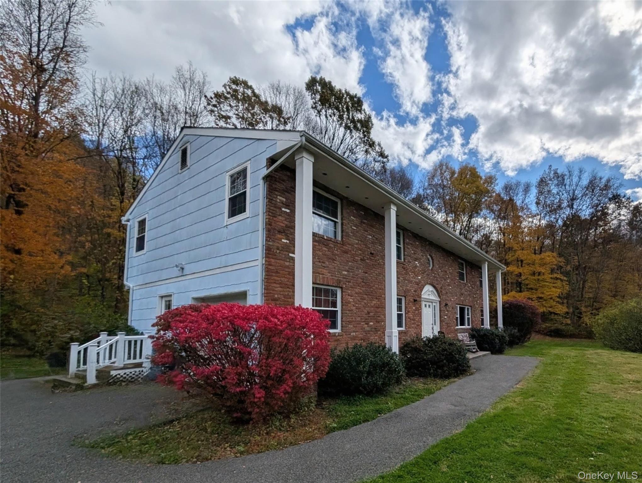 5 Equestrian Acres Lane Brewster, NY 10509 - Photo 3 of 50 a front view of a house with garden