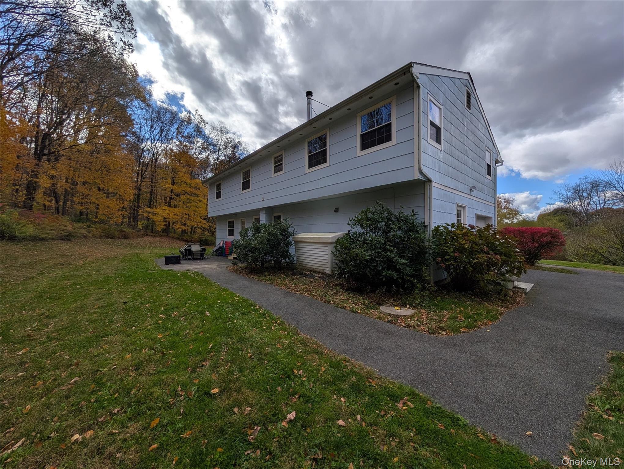 5 Equestrian Acres Lane Brewster, NY 10509 - Photo 5 of 50 a house view with a outdoor space