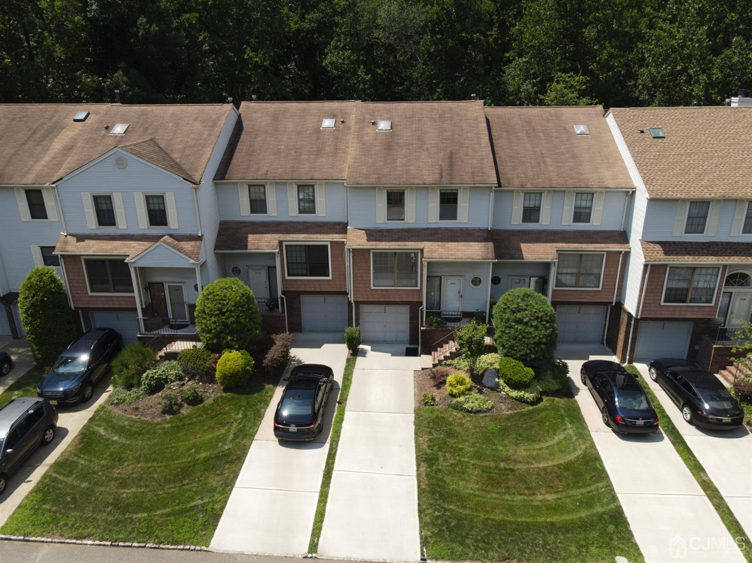 a aerial view of a house with garden
