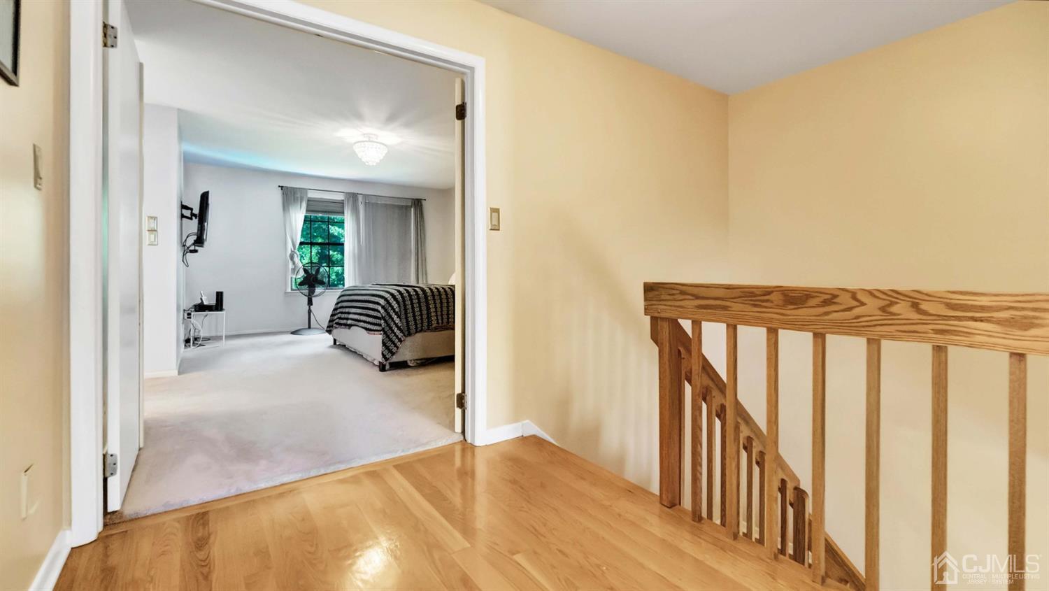 3404 Springbrook Drive Edison, NJ 08820 - Photo 19 of 32 a view of hallway with livingroom and furniture