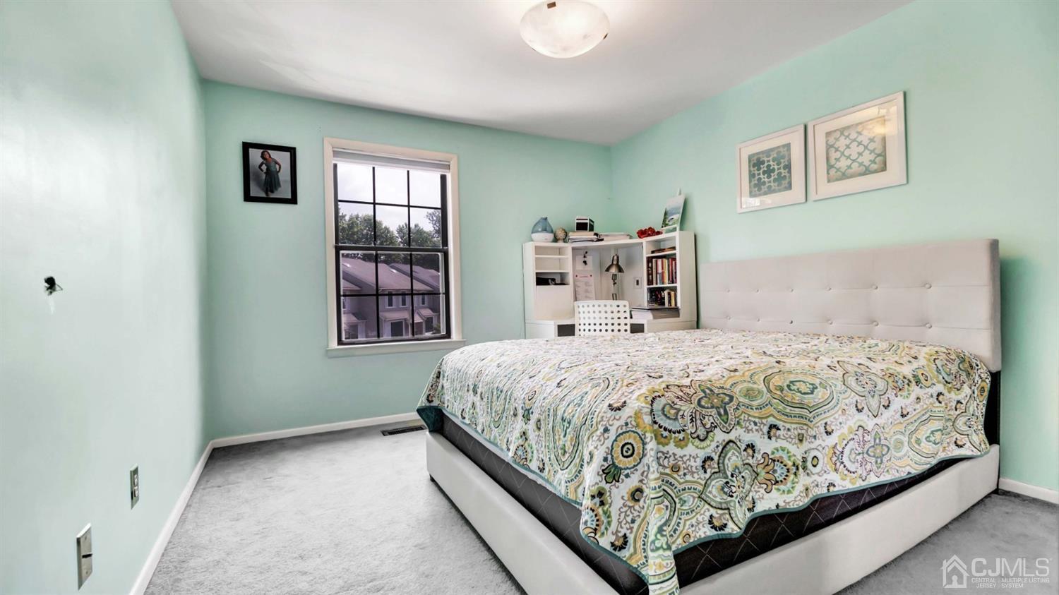 3404 Springbrook Drive Edison, NJ 08820 - Photo 24 of 32 a bedroom with a bed and a window
