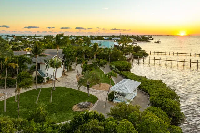 a view of a balcony with chairs