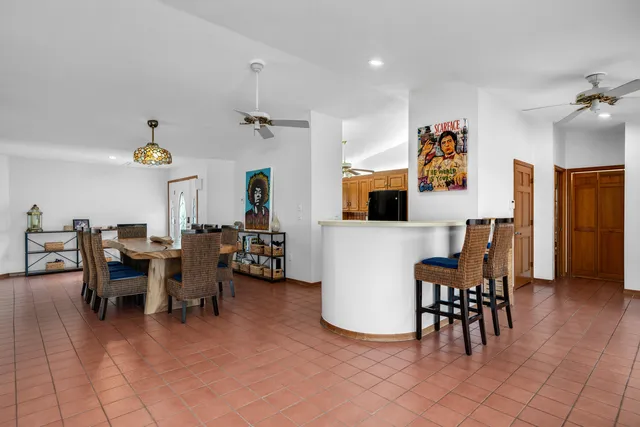 a bed room with furniture and wooden floor