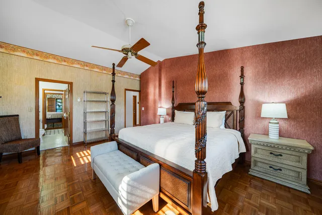 a view of kitchen with refrigerator and cabinets