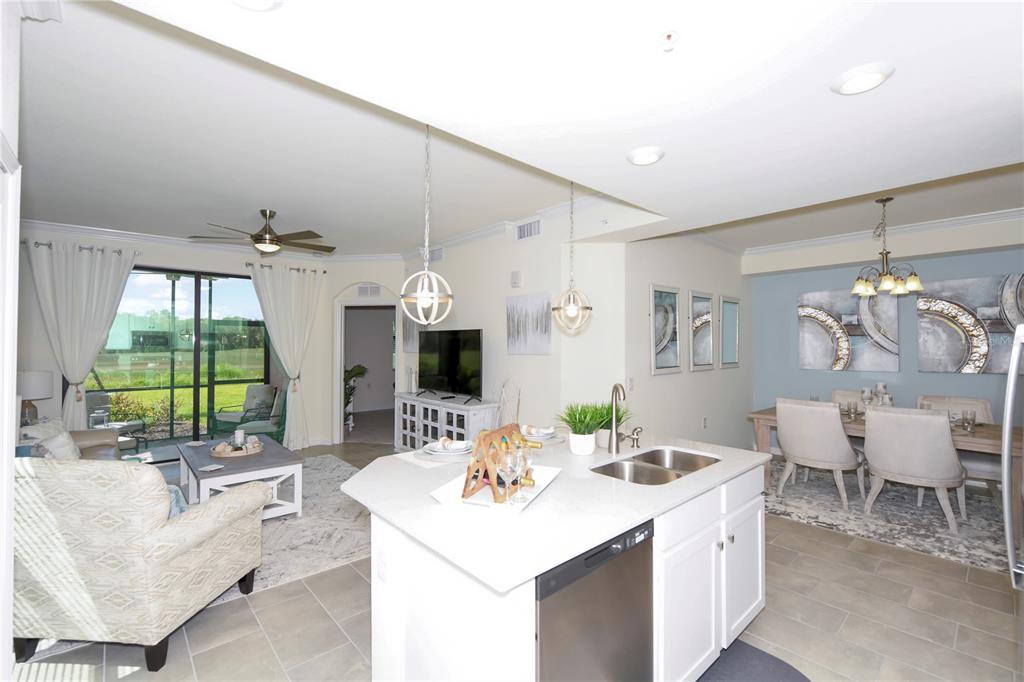 17810 Gawthrop Drive, Unit 101 Lakewood Ranch, FL 34211 - Photo 18 of 53 a living room with furniture a fireplace and a large window