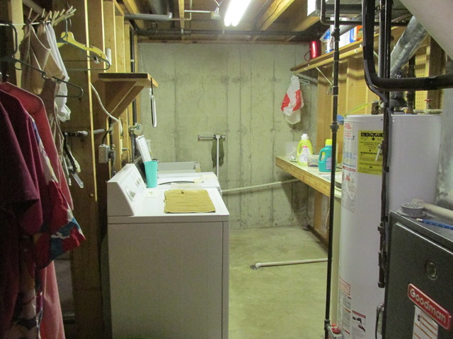 708 South Cooper Road New Lenox, IL 60451 - Photo 18 of 24 a utility room with dryer and washer