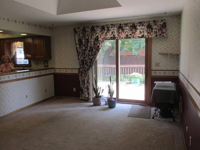 708 South Cooper Road New Lenox, IL 60451 - Photo 6 of 24 a living room with furniture and a large window