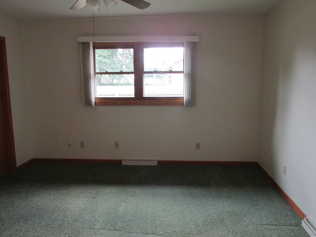 708 South Cooper Road New Lenox, IL 60451 - Photo 10 of 24 an empty room with a window